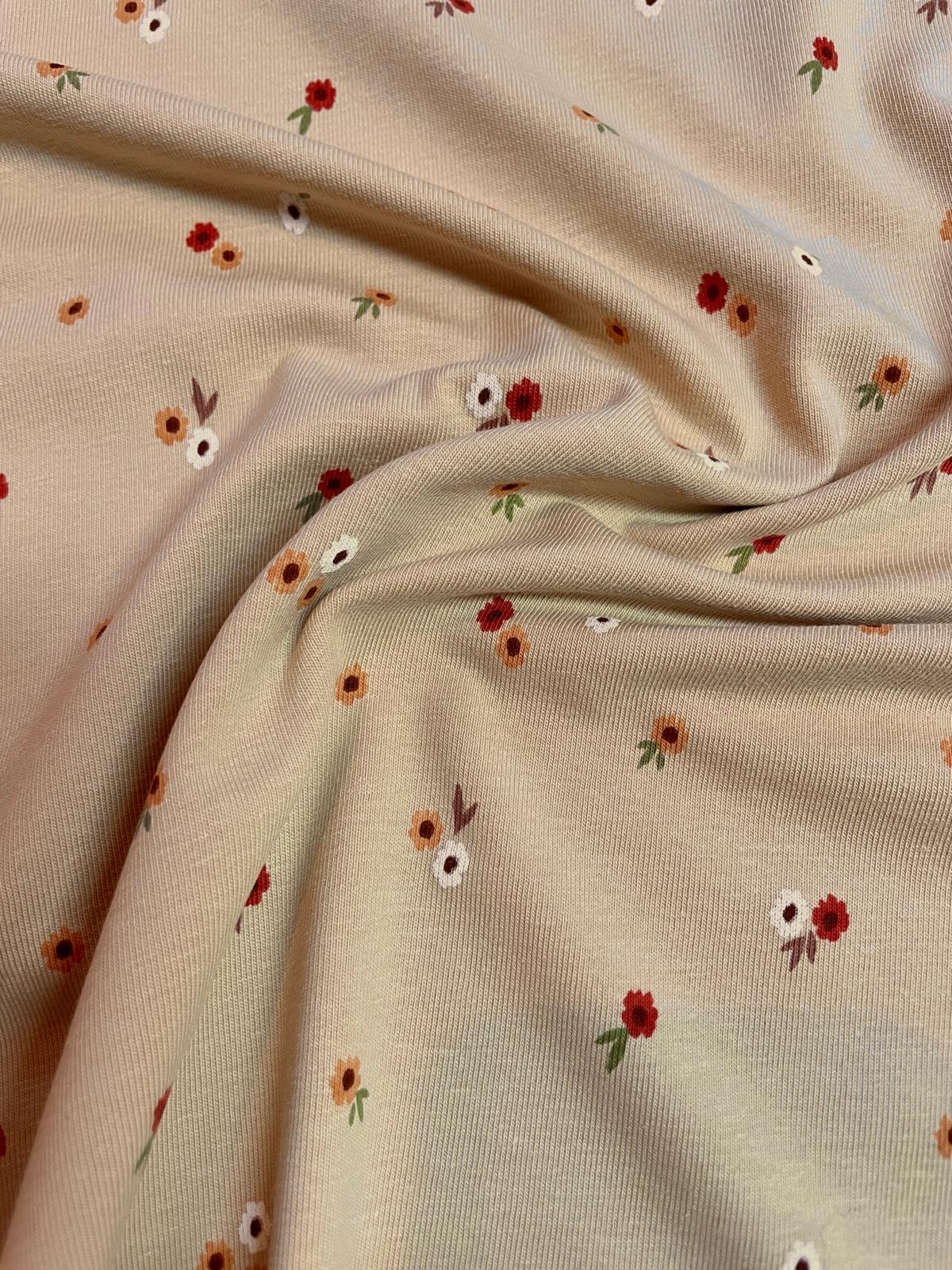 Baumwoll- Jersey mit kleinen Blumenmuster beige